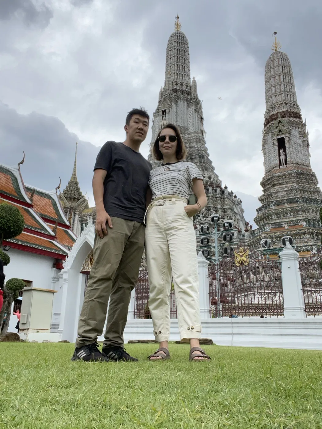 With my wife in front of the spires of Wat Arun in Bangkok, July 2023.