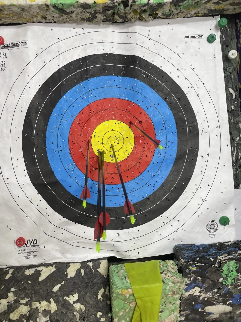 Preview of Arrow Tempo's upcoming camera scoring — an archery target with six arrows, each outlined by on-device AI detection.